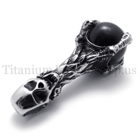 skull holding a black gem pure titanium pendant 20081